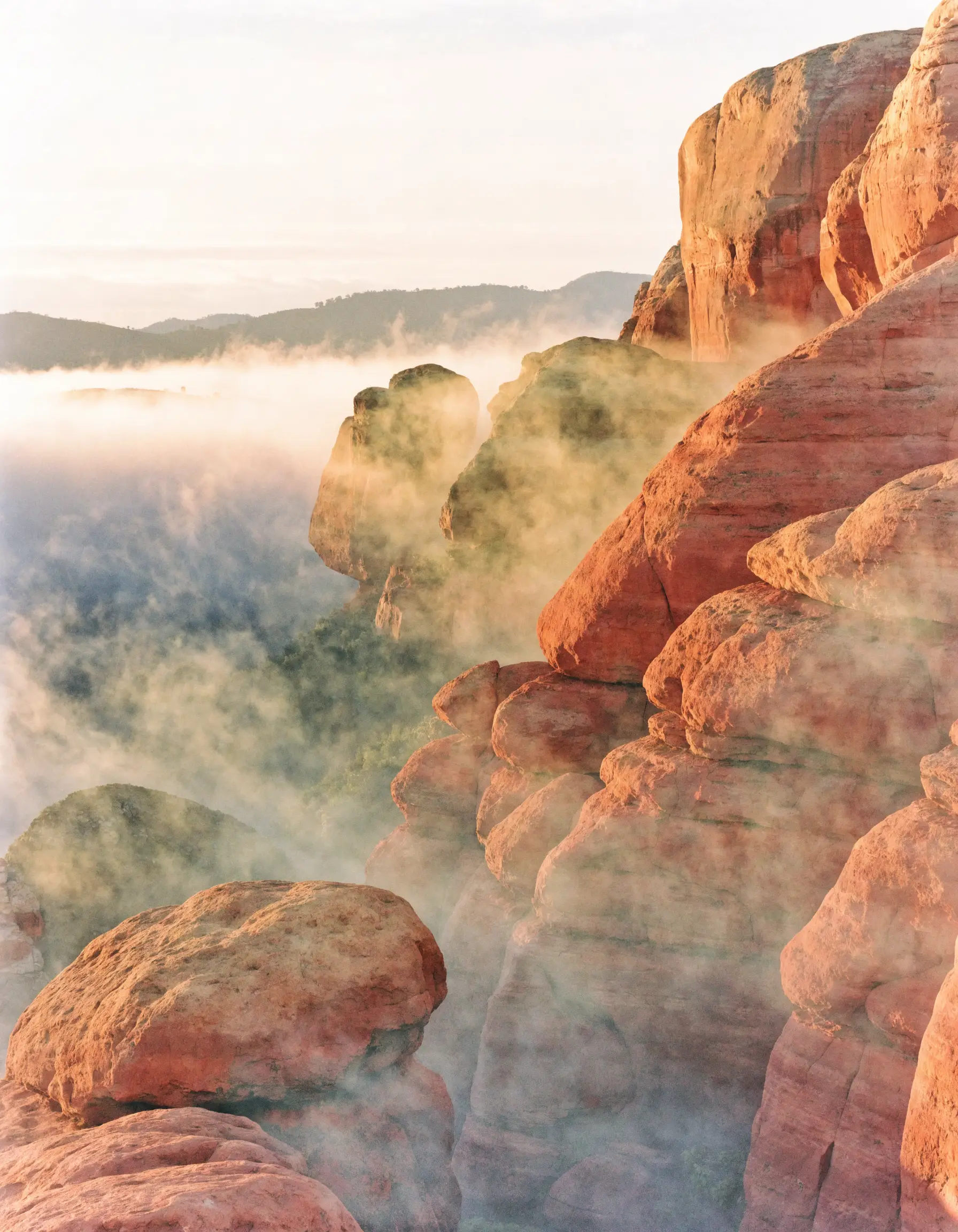 Morning mist over the red rocks around Sedona